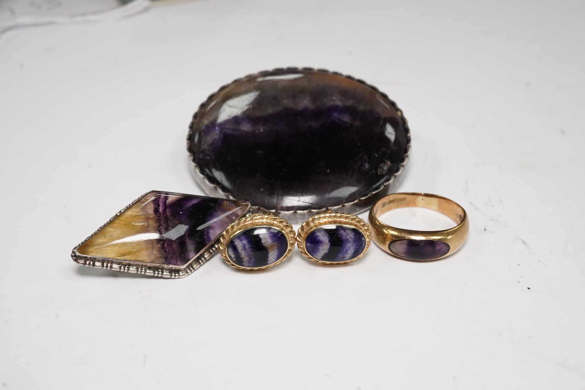 Four items of Blue John set jewellery including a pair of 9ct earrings and a 9ct ring. Condition - poor to fair